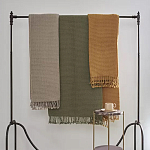 Плед из шерсти зеленого цвета с бахромой Waffle Comfort варинант исполнения - 4 | Loft Concept в Брянске