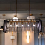 Люстра подвесная овальной формы с металлическим решетчатым абажуром матово-черного цвета и 5 лампами Kichler варинант исполнения - 7 | Loft Concept в Брянске